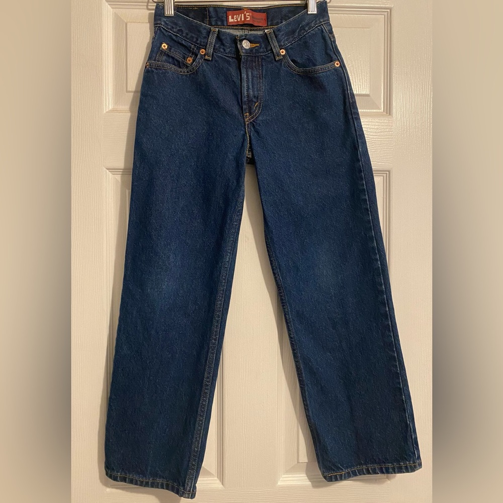 Levis 550 dark denim jeans.